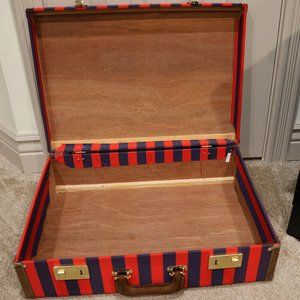 Red and Blue striped suitcase